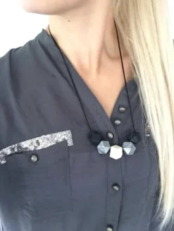 Imetyskoru (musta-hopea-ivory)